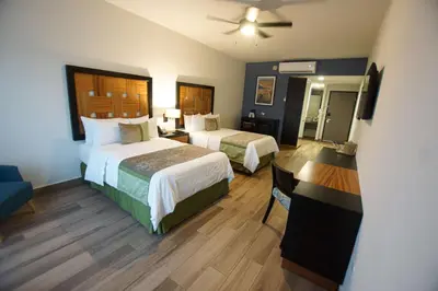 Cama o camas de una habitación en Sawari Hotel