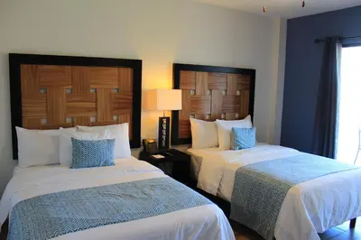 Cama o camas de una habitación en Sawari Hotel