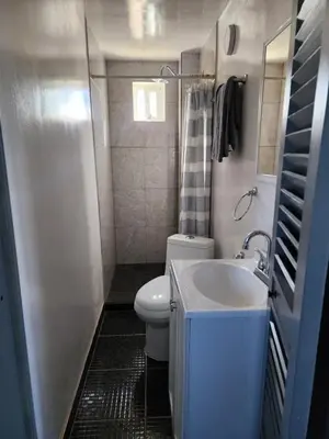 Un baño de Apartamentos Milenario
