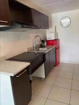 Una cocina o zona de cocina en Condominio Posada 314 San Carlos