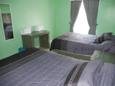 Cama o camas de una habitación en Departamentos - Cabañas Sias