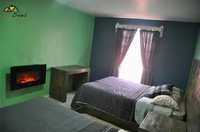 Cama o camas de una habitación en Departamentos - Cabañas Sias