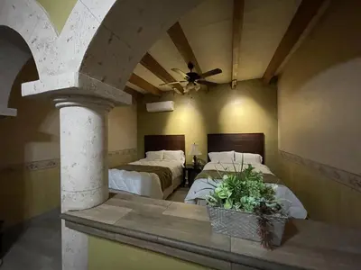 Zona de estar de Hotel Real de los Alamos