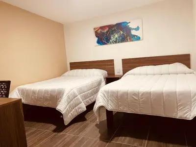Cama o camas de una habitación en La Casona Real
