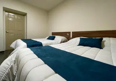 Cama o camas de una habitación en La Casona Real