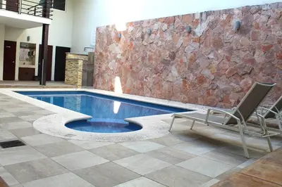 Piscina en o cerca de Departamento a 200 Mts de la playa y alberca en planta baja