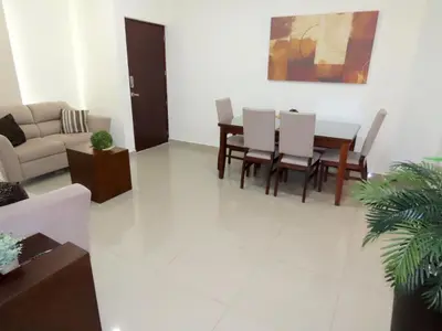 Zona de estar de Departamento a 200 Mts de la playa y alberca en planta baja