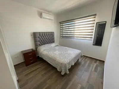 Cama o camas de una habitación en Depto. totalmente nuevo y amueblado