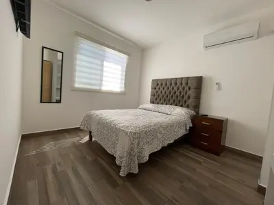 Cama o camas de una habitación en Depto. totalmente nuevo y amueblado