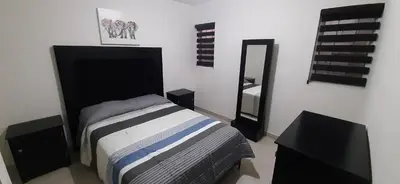 Cama o camas de una habitación en Casa Mina la prieta