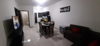 Una televisión o centro de entretenimiento en Casa Mina la prieta