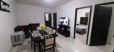 Una televisión o centro de entretenimiento en Casa Mina la prieta