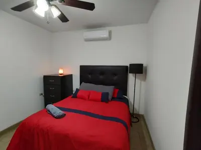 Cama o camas de una habitación en Hospedajes la Quinta