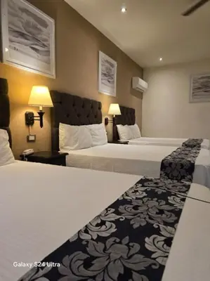 Cama o camas de una habitación en Hotel Plaza