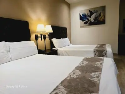 Cama o camas de una habitación en Hotel Plaza