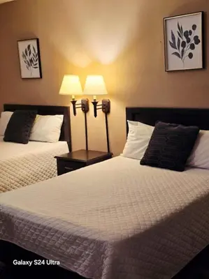 Cama o camas de una habitación en Hotel Plaza