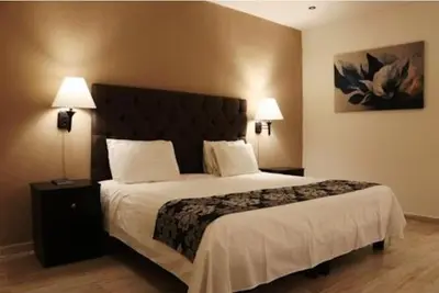 Cama o camas de una habitación en Hotel Plaza