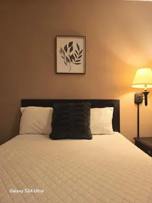 Cama o camas de una habitación en Hotel Plaza