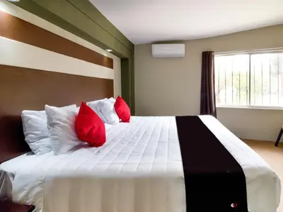 Cama o camas de una habitación en Hotel La Fuente, Saltillo