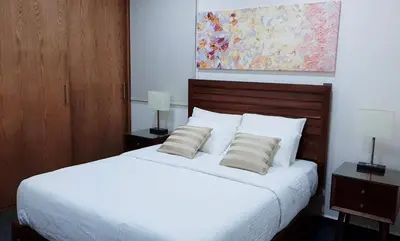 Cama o camas de una habitación en BOCA DE CIELO Departamento frente al mar con ocasos increíbles
