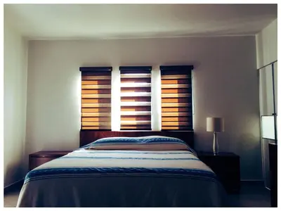 Cama o camas de una habitación en Big House Pool Grill, 4 Bedrooms 12 ppl AC Ocean view TV WIFI