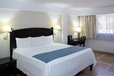 Cama o camas de una habitación en Hotel Armida Guaymas