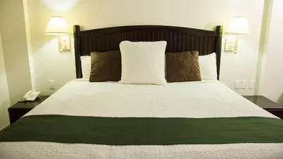 Cama o camas de una habitación en Hotel Armida Guaymas