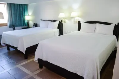 Cama o camas de una habitación en Hotel Armida Guaymas