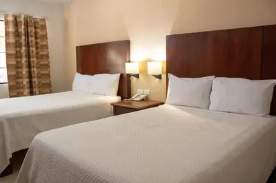 Cama o camas de una habitación en Hotel Armida Guaymas