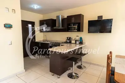 Una cocina o zona de cocina en Hermosa Casa, Cerca del Mar, 3 min de la Playa