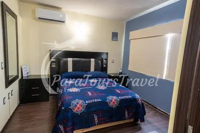 Cama o camas de una habitación en Hermosa Casa, Cerca del Mar, 3 min de la Playa