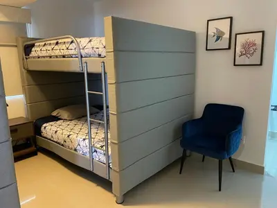 Cama o camas de una habitación en a pie de playa con hermosa vista by G P S rentas