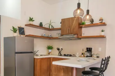 Una cocina o zona de cocina en Lofts Loreto Baja California Sur