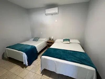 Cama o camas de una habitación en Dpto CASA BRISA! a 600 metros de Playa&Malecon! Alberca!