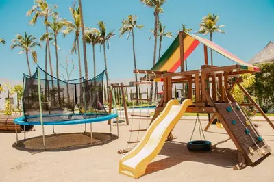 Zona de juegos infantil en Moderno Departamento En Residencial Privado