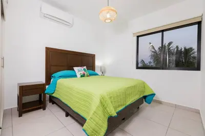 Cama o camas de una habitación en Moderno Departamento En Residencial Privado