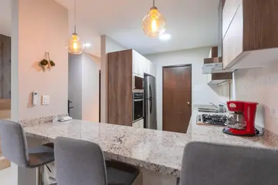 Una cocina o zona de cocina en Casa Caracol. Cerca de la playa en residencial privado!