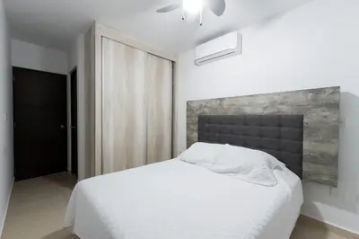 Cama o camas de una habitación en Casa en residencial para 8 personas cerca de la playa!!
