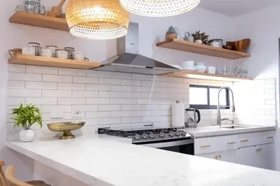 Una cocina o zona de cocina en - CASA PALMA - Moderna casa a pasos de la playa