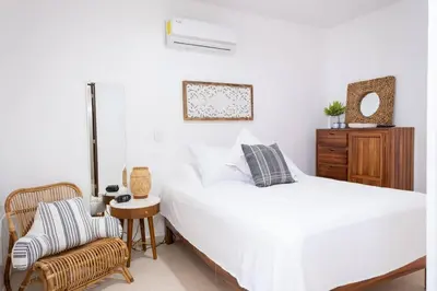 Cama o camas de una habitación en - CASA PALMA - Moderna casa a pasos de la playa