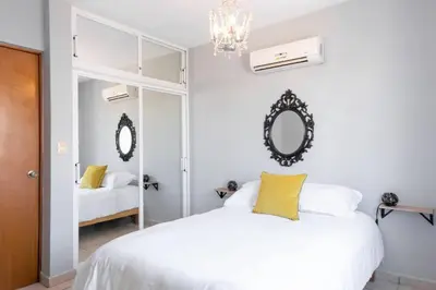 Cama o camas de una habitación en Surf House! Bonita casa vacacional en excelente ubicación
