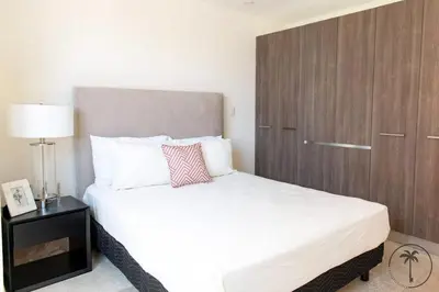 Cama o camas de una habitación en Terraza con vista al mar y a atardeceres