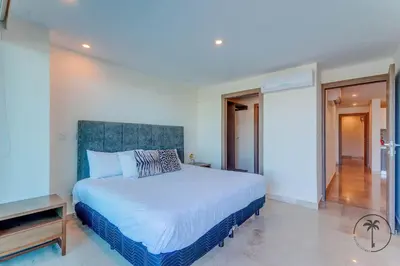 Cama o camas de una habitación en Hermosa terraza con vista a la laguna!