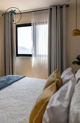 Cama o camas de una habitación en Moderno condominio con vista al mar!