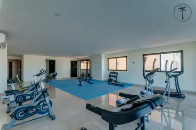 Gimnasio o instalaciones de fitness de Moderno condominio con vista al mar!