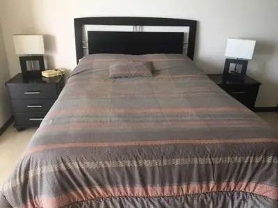 Cama o camas de una habitación en Beautiful 3 bedroom, fully furnished, on the beach