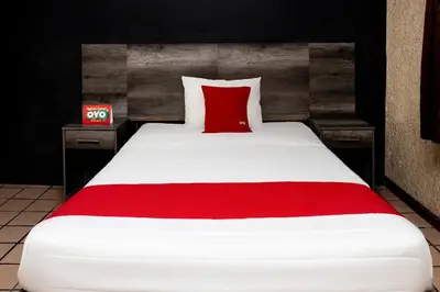 Cama o camas de una habitación en OYO Hotel Real Del Sur, Estadio Chihuahua