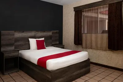 Cama o camas de una habitación en OYO Hotel Real Del Sur, Estadio Chihuahua