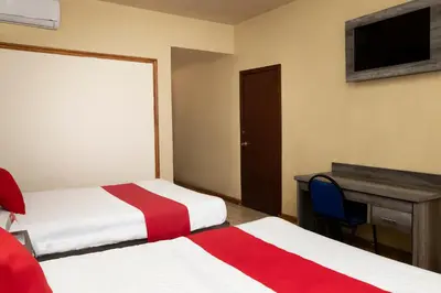 Cama o camas de una habitación en OYO Hotel Real Del Sur, Estadio Chihuahua
