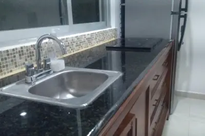 Una cocina o zona de cocina en Apartmento con alberca a 50 mt del mar La Licha
